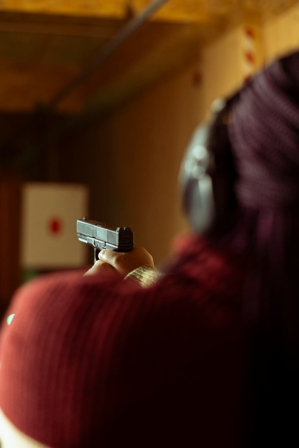 Certified TGK instructor coaching a student through precision rifle fundamentals on the range