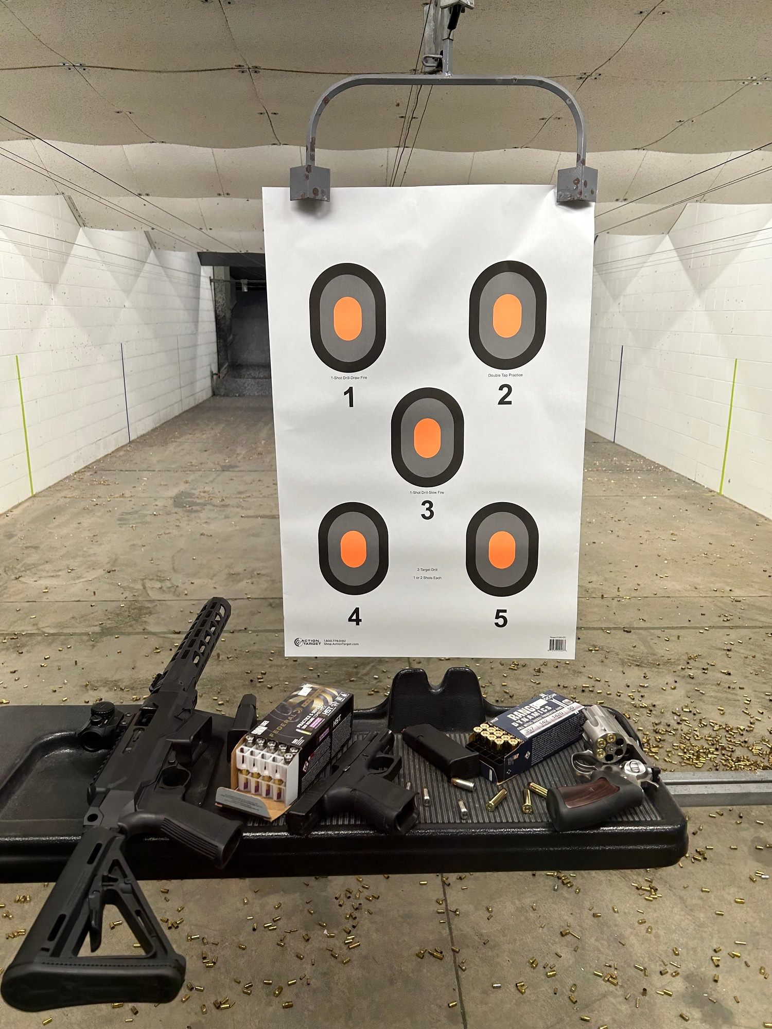 Instructor providing individual coaching during a precision marksmanship range session